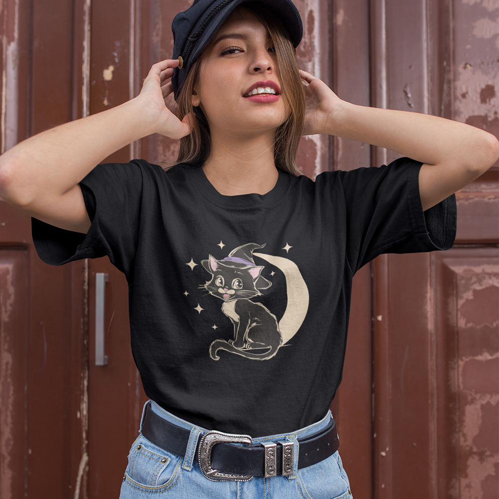 Witchy Kitty Softstyle T-Shirt - Halloween Graphic Tee with Black Cat and Witch Hat with Crescent Moon Print