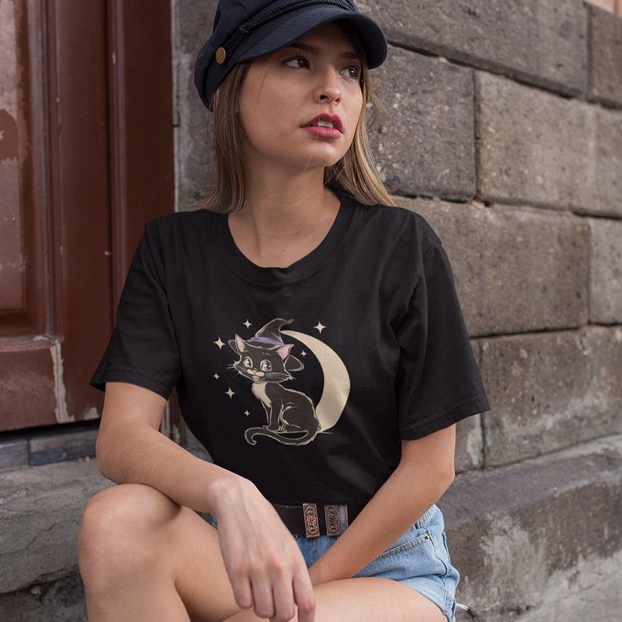 Witchy Kitty Softstyle T-Shirt - Halloween Graphic Tee with Black Cat and Witch Hat with Crescent Moon Print